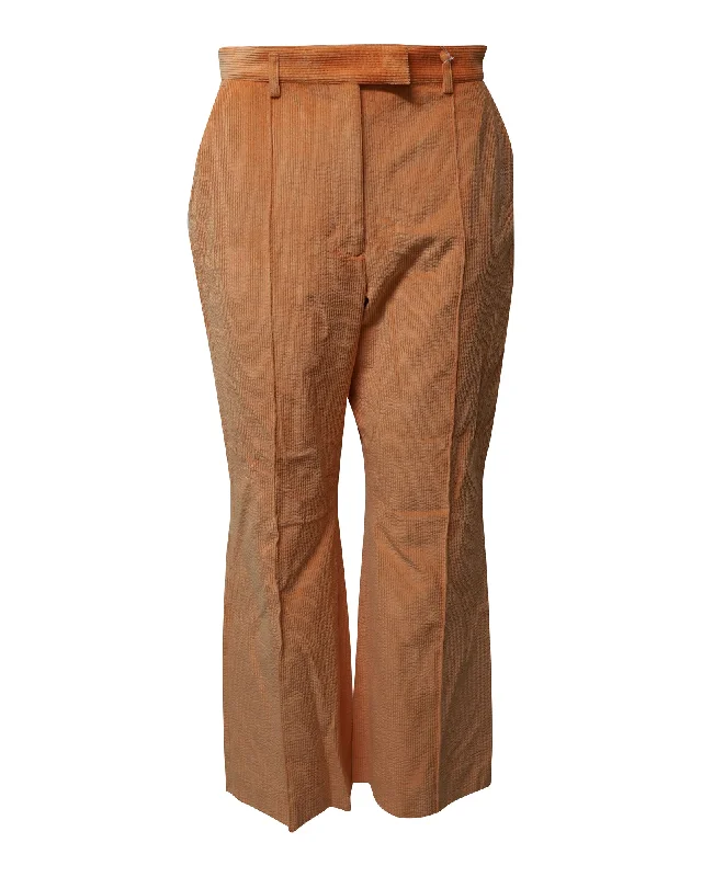 women's high-waisted leggings -Acne Studios Flared Hem Pants in Orange Corduroy